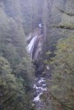 Twin_Falls_Olallie_17_028_07302017 - Distant zoomed in look at Twin Falls from the overlook, where only part of its total drop could be seen due to the trees growing around it