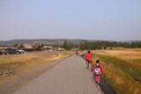 Upper_Geyser_Basin_17_060_08112017 - Julie and Tahia making their way along the wide open paved trails and boardwalks leading towards the far end of the Upper Geyser Basin where we sought out the Morning Glory Pool