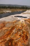 Upper_Geyser_Basin_17_227_08112017 - Looking down at a colorful spring alongside the Firehole River