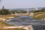 Upper_Geyser_Basin_17_231_08112017 - Another look along the Firehole River flanked by venting steams and springs in the Upper Geyser Basin