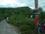 Vesleulfossen_001_07012005 - Red sign marking the Peer Gynt Trail near the trailhead