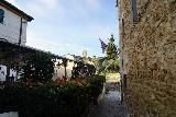 Vignoni_016_11182023 - Briefly exploring the exterior of the Albergo Le Terme in Bagno Vignoni before breakfast
