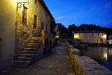 Vignoni_054_11192023 - Looking along the far end of the centro storico of Bagno Vignoni in the twilight