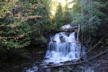 Wagner Falls was a small 20ft multi-tiered waterfall that was pretty convenient for us to visit.  It was just outside the town limits of Munising, and we only needed to walk on a short trail and...