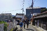 Yoshinoyama_034_04092023 - Approaching some tall building in Yoshino Town where the road will fork again