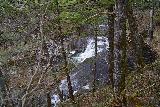 Yudaki_068_04132023 - Partial look across the brink of Kotaki Falls as seen through some tree branches