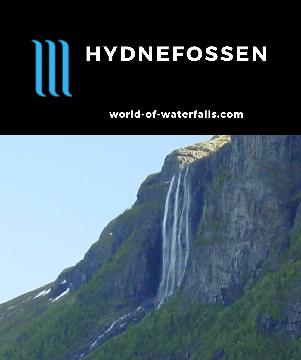 Hydnefossen is a tall 140m waterfall watched over by the 1300m Veslehorn Mountain in the famed ski resort area of Hemsedal Valley in Buskerud County, Norway.