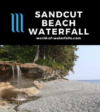 The Sandcut Beach Waterfall is a pair of 10-15ft waterfalls on the south of Vancouver Island reached by a walk through rainforest and beach near Jordan River.
