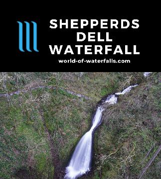 The Shepperds Dell Waterfall is a roadside feature tumbling beneath an arch bridge into the Shepperd's Dell Gorge beneath the Historic Columbia River Highway.